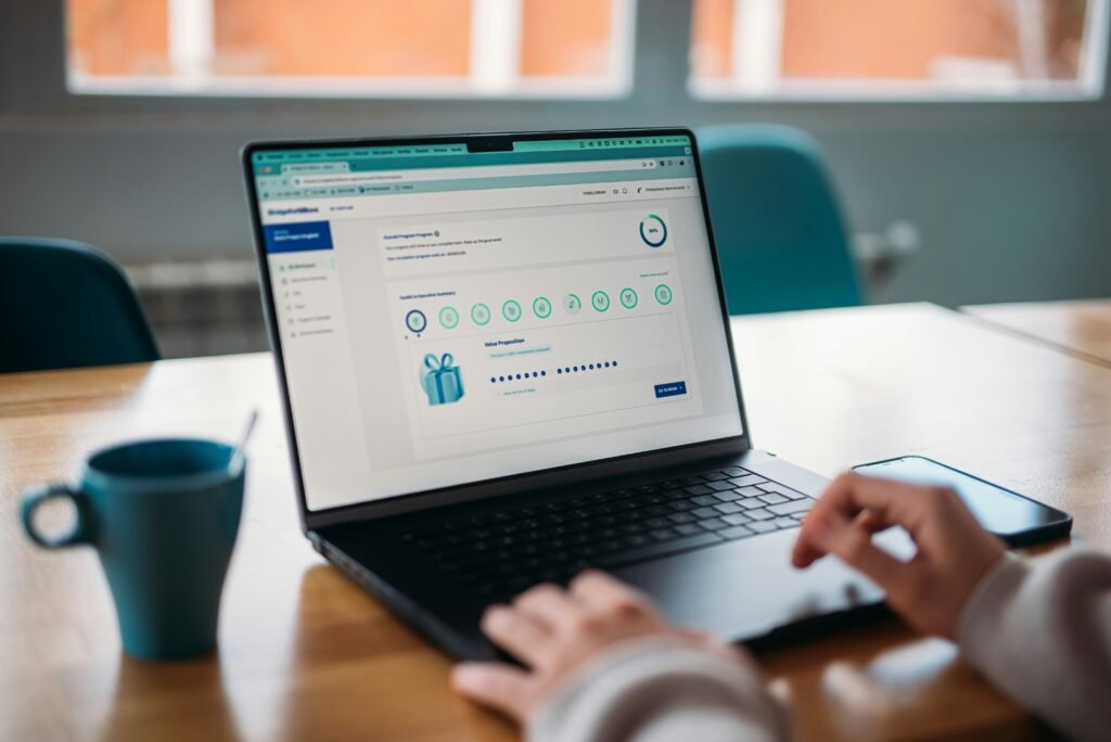 Laptop showing credit report checklist, representing steps to improve your credit score